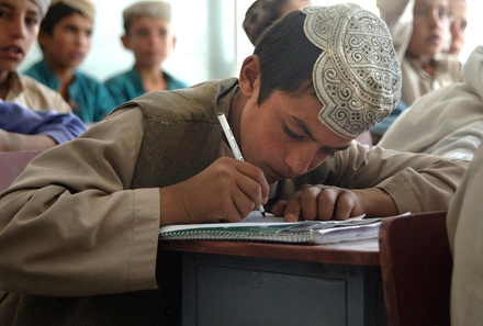 Afghan student takes notes