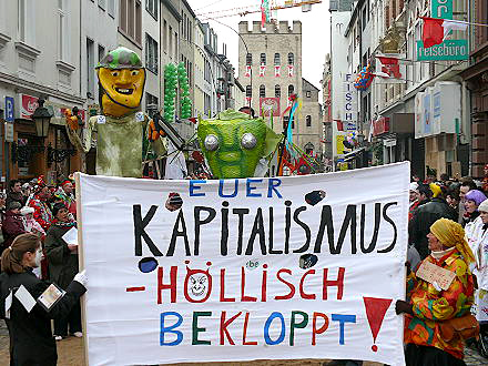 Kapitalismus Rosenmontagszug Köln 2009 G8-Pappnasen Foto: Arbeiterfotografie